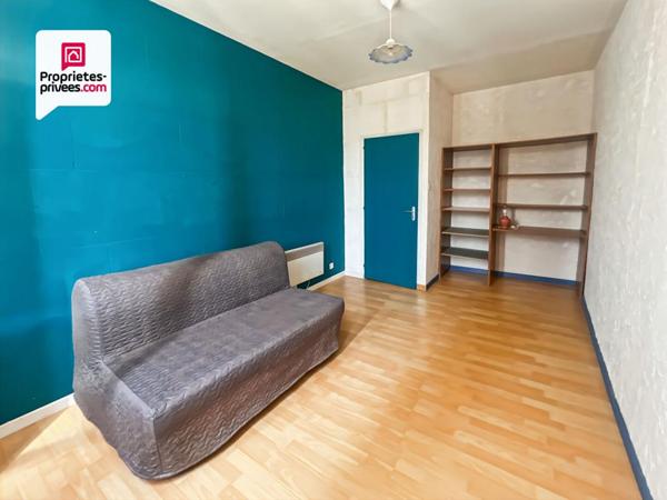 Immeuble en pierre de 156 m² avec local commercial + maison avec jardin