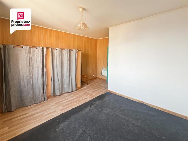 Immeuble en pierre de 156 m² avec local commercial + maison avec jardin