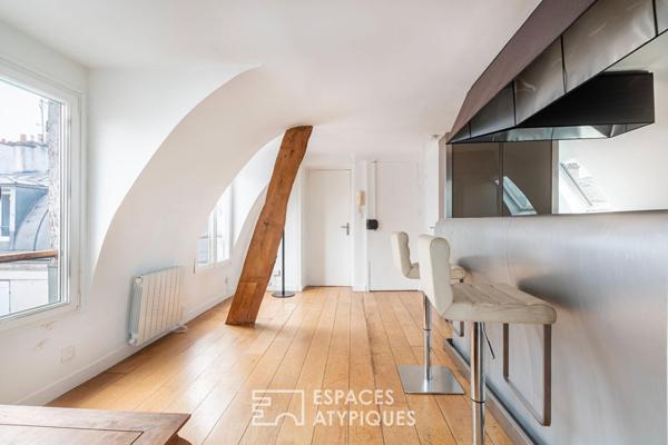 Appartement sous les toits de Paris avec vue sur la colonne de la Bastille