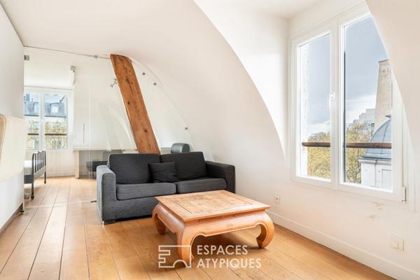 Appartement sous les toits de Paris avec vue sur la colonne de la Bastille