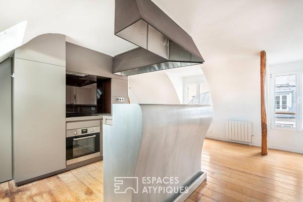 Appartement sous les toits de Paris avec vue sur la colonne de la Bastille