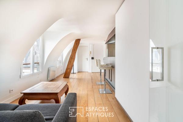 Appartement sous les toits de Paris avec vue sur la colonne de la Bastille