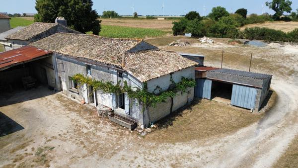Ancienne ferme à rénover avec terrain constructible