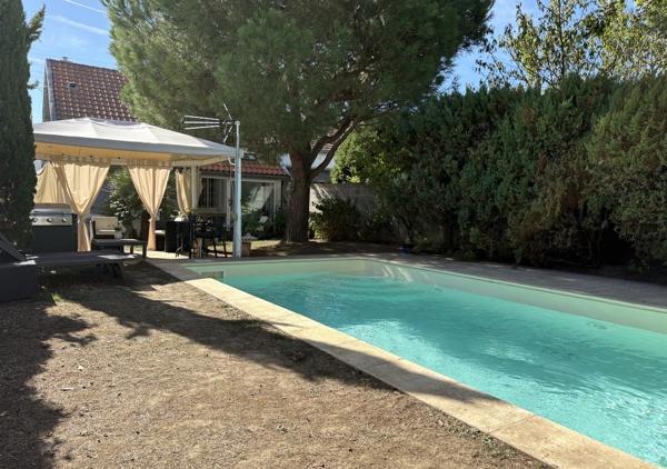 Maison 114 m² avec piscine, jardin et garage sur une parcelle de 387 m²