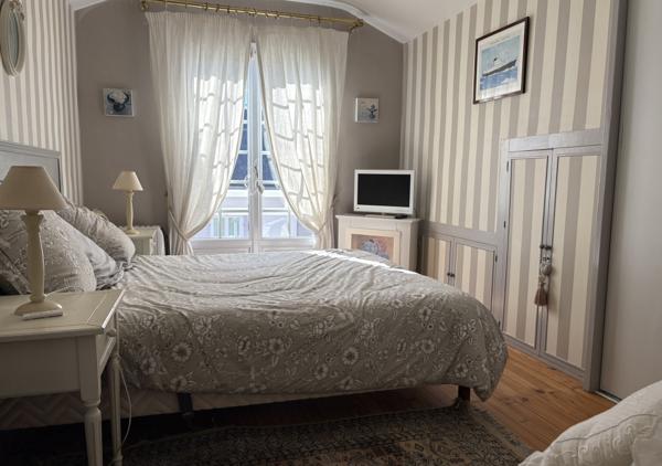 Maison 114 m² avec piscine, jardin et garage sur une parcelle de 387 m²