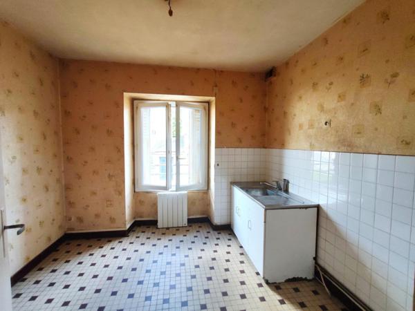 Coeur de ville ! Appartement à rénover de type T2 avec garage