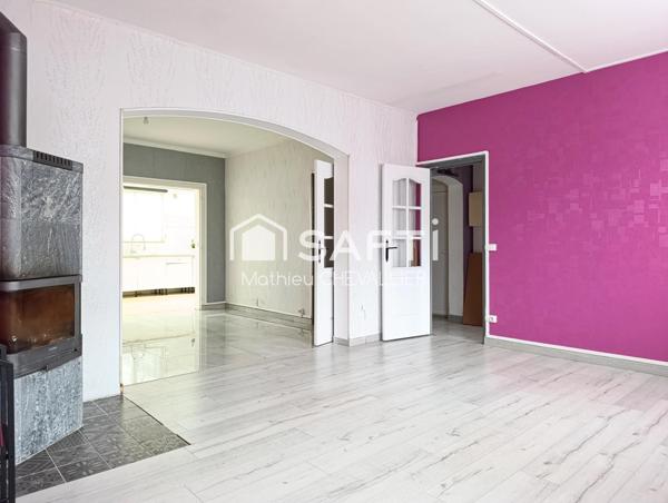 Maison spacieuse avec jardin et garage