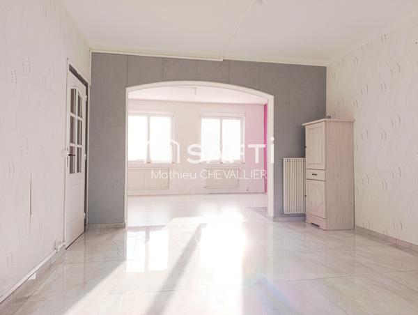 Maison spacieuse avec jardin et garage