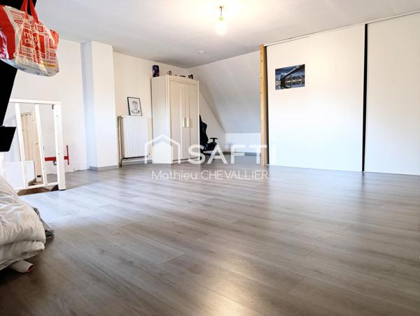 Maison spacieuse avec jardin et garage