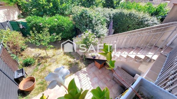 Maison T4 avec jardin, garage et stationnement – cœur de village, au calme