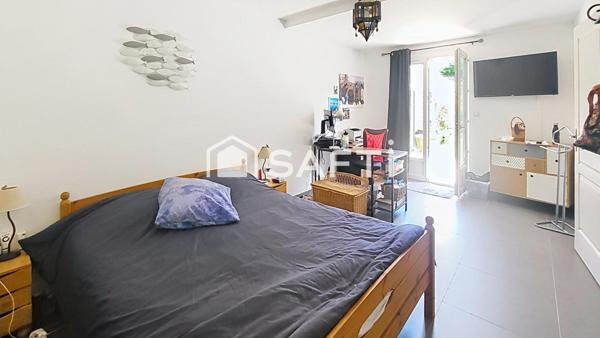 Maison T4 avec jardin, garage et stationnement – cœur de village, au calme