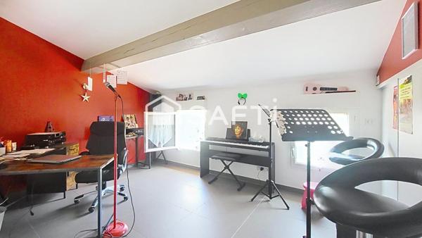 Maison T4 avec jardin, garage et stationnement – cœur de village, au calme