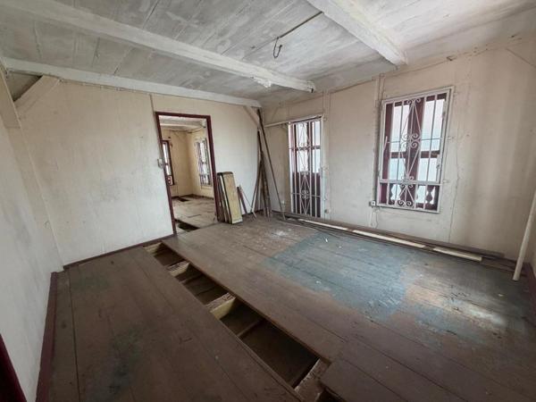 MAISON CREOLE EN BRIQUE ET BOIS  A REHABILITE AU CENTRE VILLE DE CAYENNE