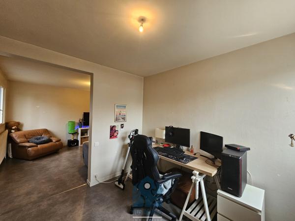 Appartement 3 pièces 1 chambre avec cave et parking