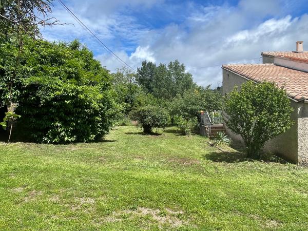 Maison individuelle de 110m² avec grand terrain arboré