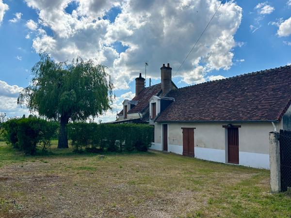 Maison ancienne dans un cadre naturel