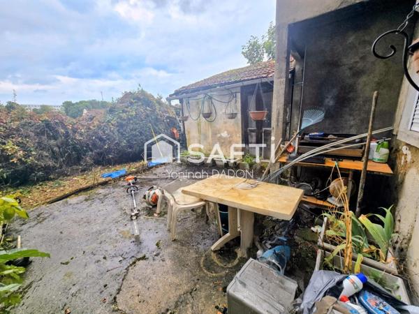 MAISON  AVEC TERRAIN A FORT POTENTIEL