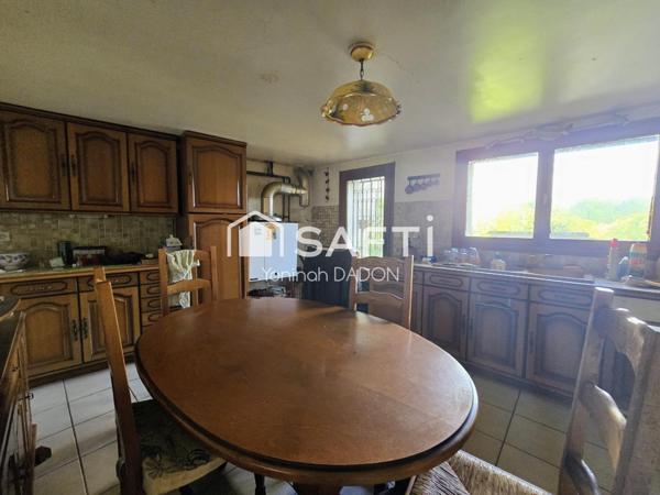 MAISON  AVEC TERRAIN A FORT POTENTIEL