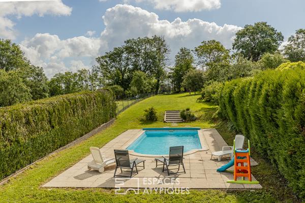 Maison avec appartement indépendant et piscine dans un écrin de verdure