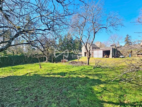 Grange avec garage attenant et 1000m² de terrain