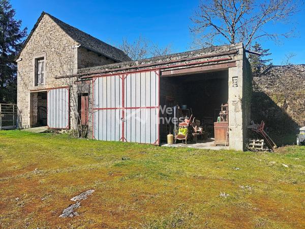 Grange avec garage attenant et 1000m² de terrain