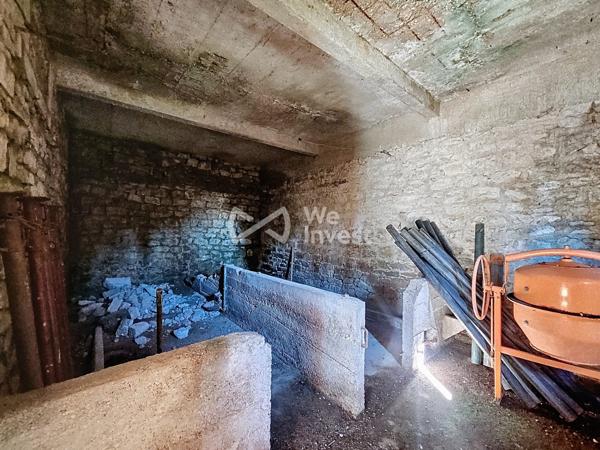 Grange avec garage attenant et 1000m² de terrain