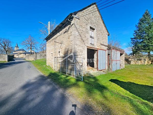 Grange avec garage attenant et 1000m² de terrain