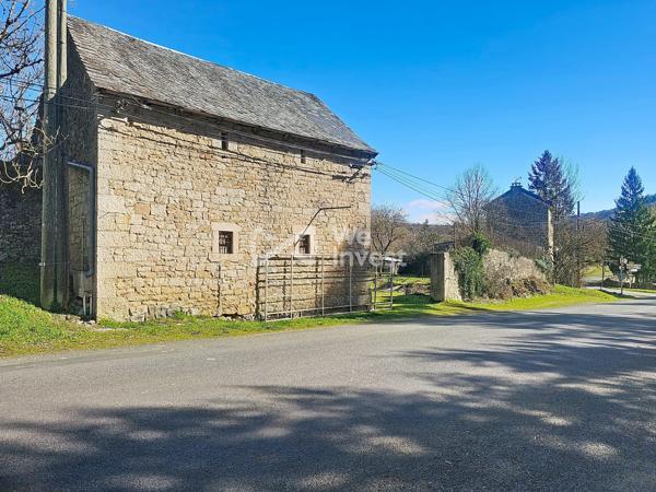 Grange avec garage attenant et 1000m² de terrain