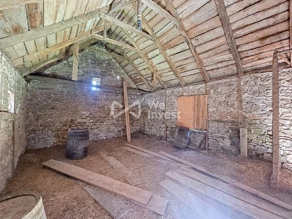 Grange avec garage attenant et 1000m² de terrain