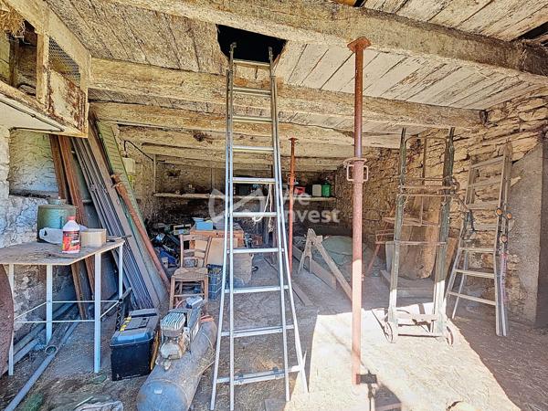 Grange avec garage attenant et 1000m² de terrain