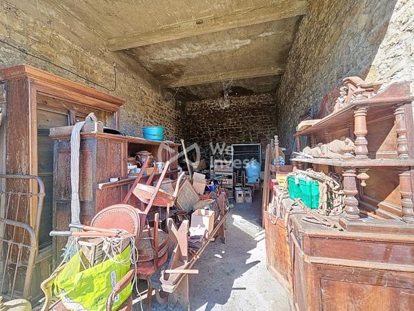 Grange avec garage attenant et 1000m² de terrain