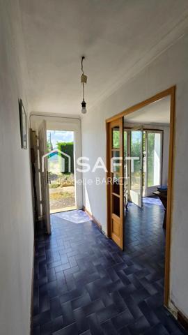 Coup de cœur en devenir : maison avec beau potentiel dans un cadre paisible