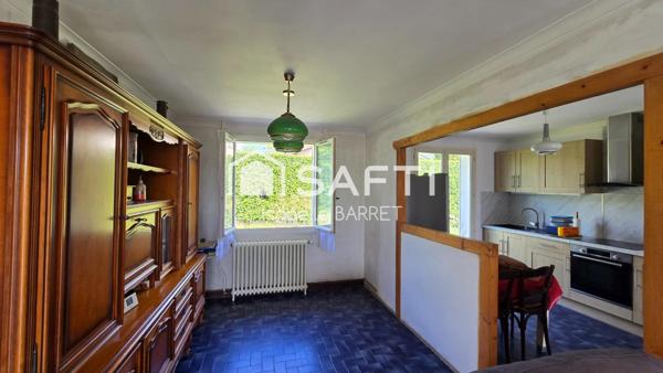 Coup de cœur en devenir : maison avec beau potentiel dans un cadre paisible