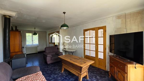 Coup de cœur en devenir : maison avec beau potentiel dans un cadre paisible