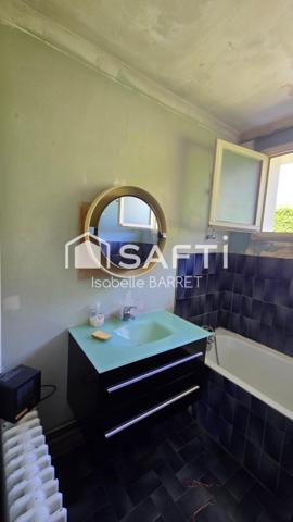 Coup de cœur en devenir : maison avec beau potentiel dans un cadre paisible