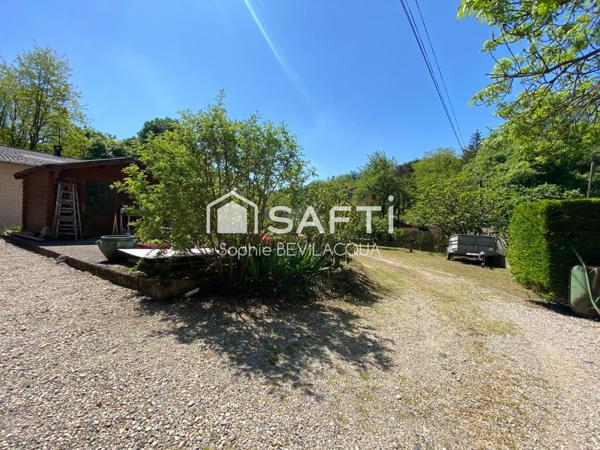 MAISON INDIVIDUELLE SANS VIS A VIS AVEC TERRAIN ET HANGAR