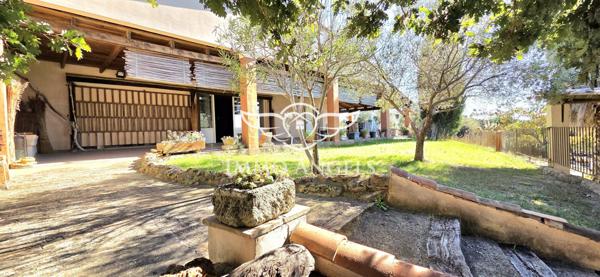 Propriété de caractère avec domaine viticole en AOP Costières de Nîmes