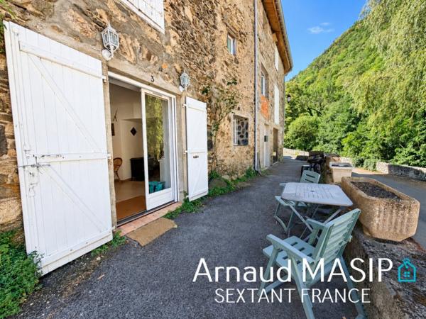 MAISON EN PIERRES AVEC ATELIER DANS VILLAGE TRANQUIL PRISE