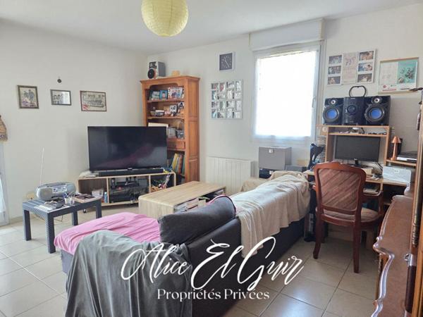 Appartement T3 avec terrasse au RDC et 2 places de parking