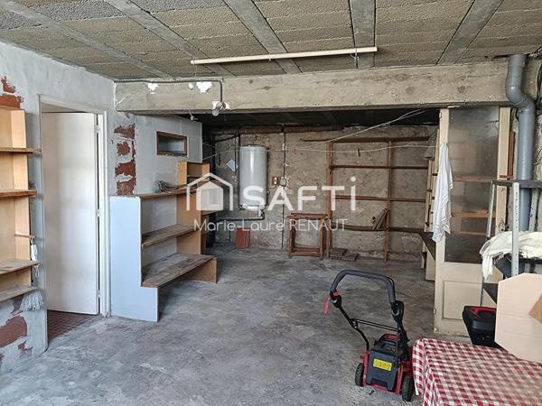 Maison avec beau potentiel – 3 chambres – Garage - Jardin