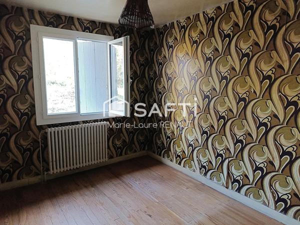 Maison avec beau potentiel – 3 chambres – Garage - Jardin