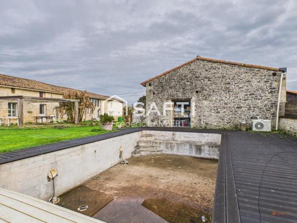 Longère de charme avec dépendances et piscine
