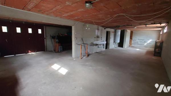 Pavillon sur sous sol surélevé