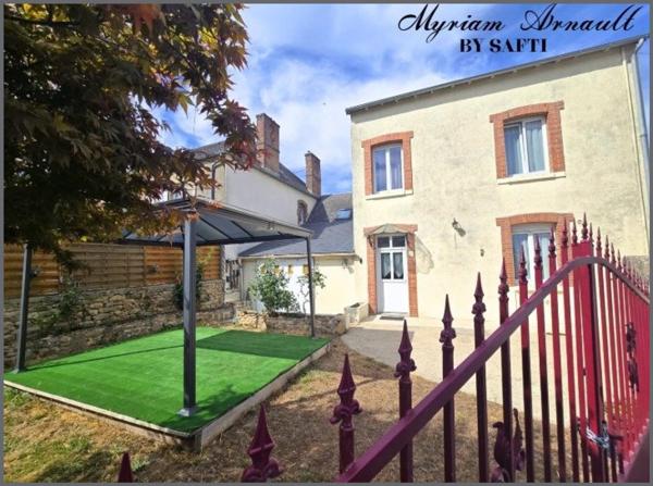 Grande maison de ville avec jardin