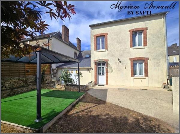 Grande maison de ville avec jardin