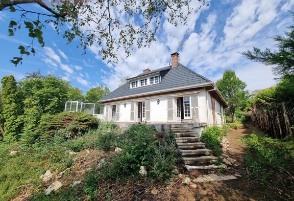 Charmante maison dans secteur résidentiel