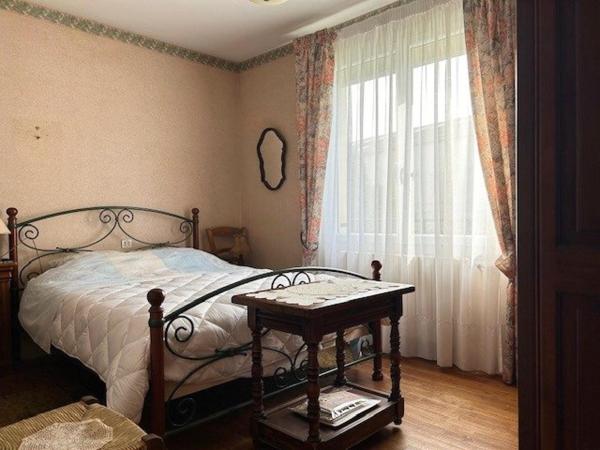 Maison proche des commerces, écoles dans une rue calme