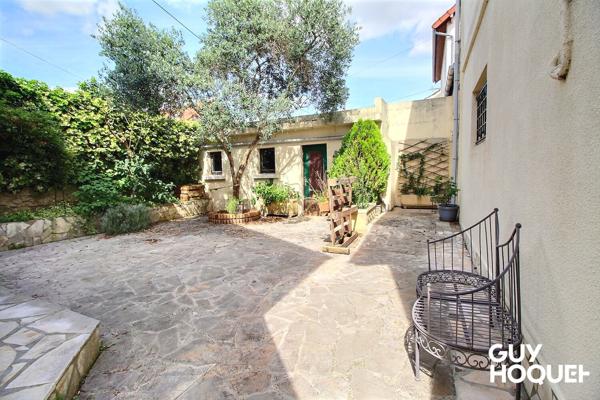 Jolie maison avec cour intérieure et garage . Proche gare de Juvisy