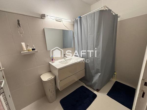 MAISON T4 JUMELEE AVEC  JARDIN;