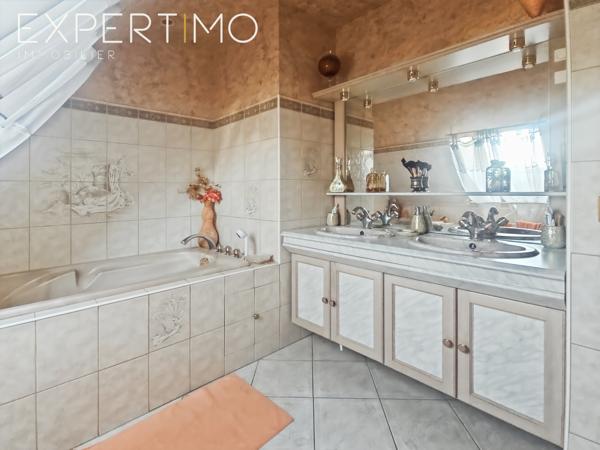 Maison 164 m² avec véranda et terrain de 1 566 m²
